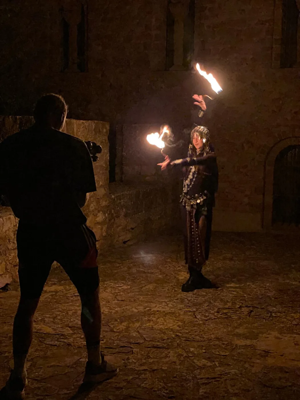 Filming a fire performer