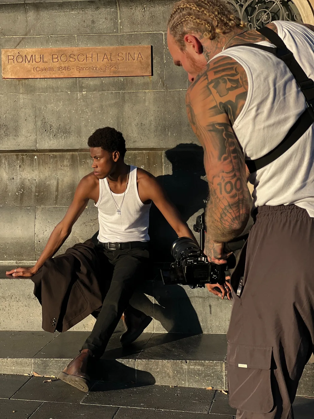 Noah operating a cinema camera during a fashion shoot